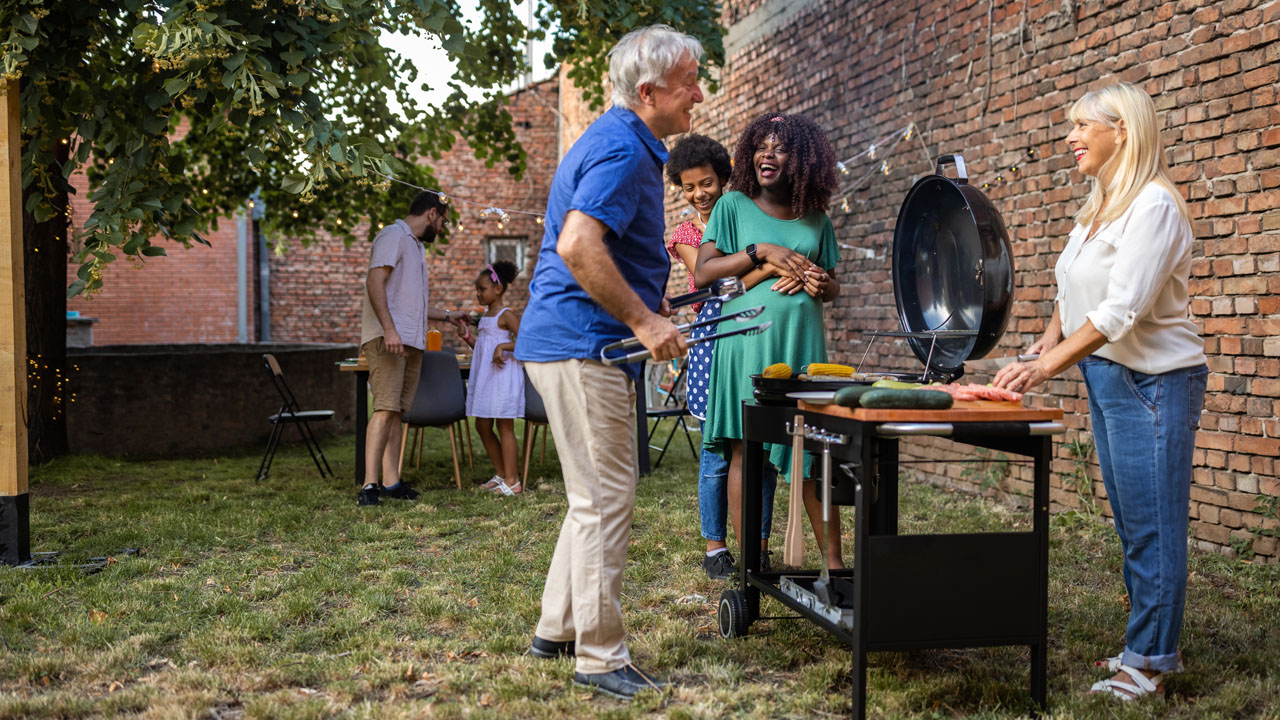 Family having a bbq party at their backyard
